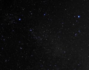 The constellation of Cygnus is on the left, and Lyra (with the brightest star, Vega), on the right