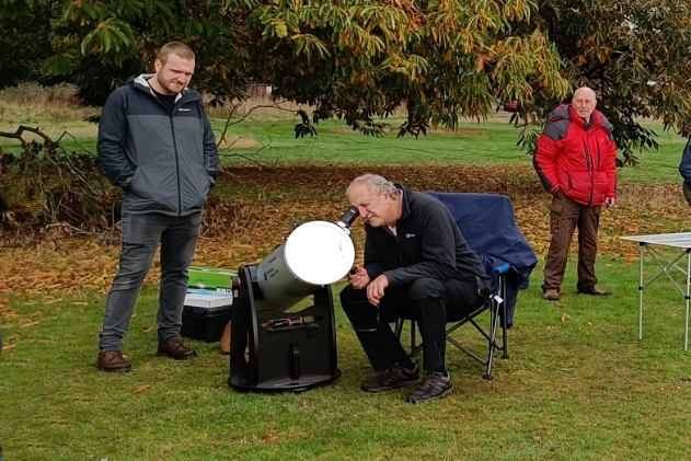 Neil Willis using his Dobsonian telescope fitted with Baader film